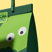 The Chamo arepas bag, its illustrated face against yellow