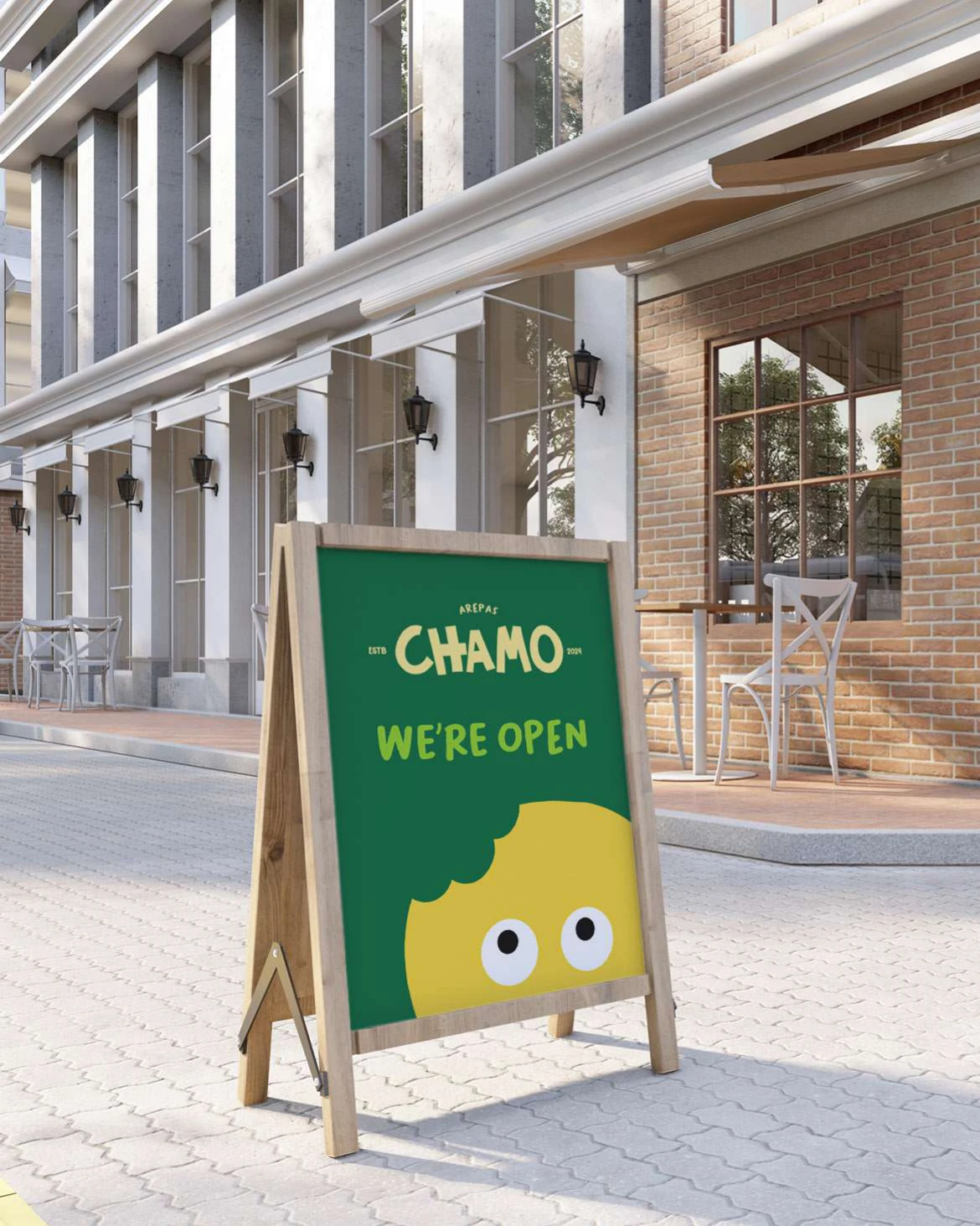 Chamo: pavement sign reading we are open