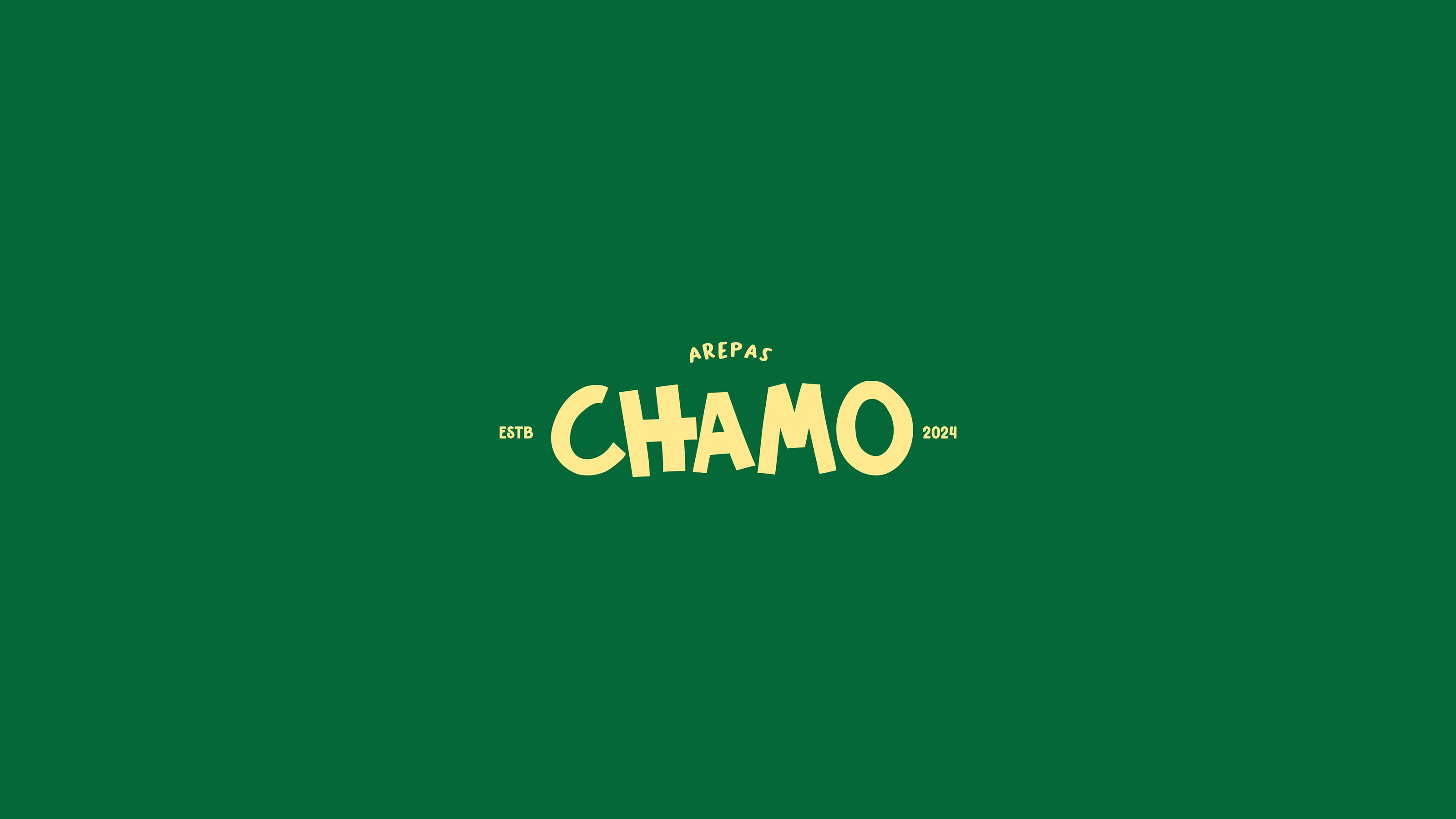 Chamo: the primary wordmark on brand green