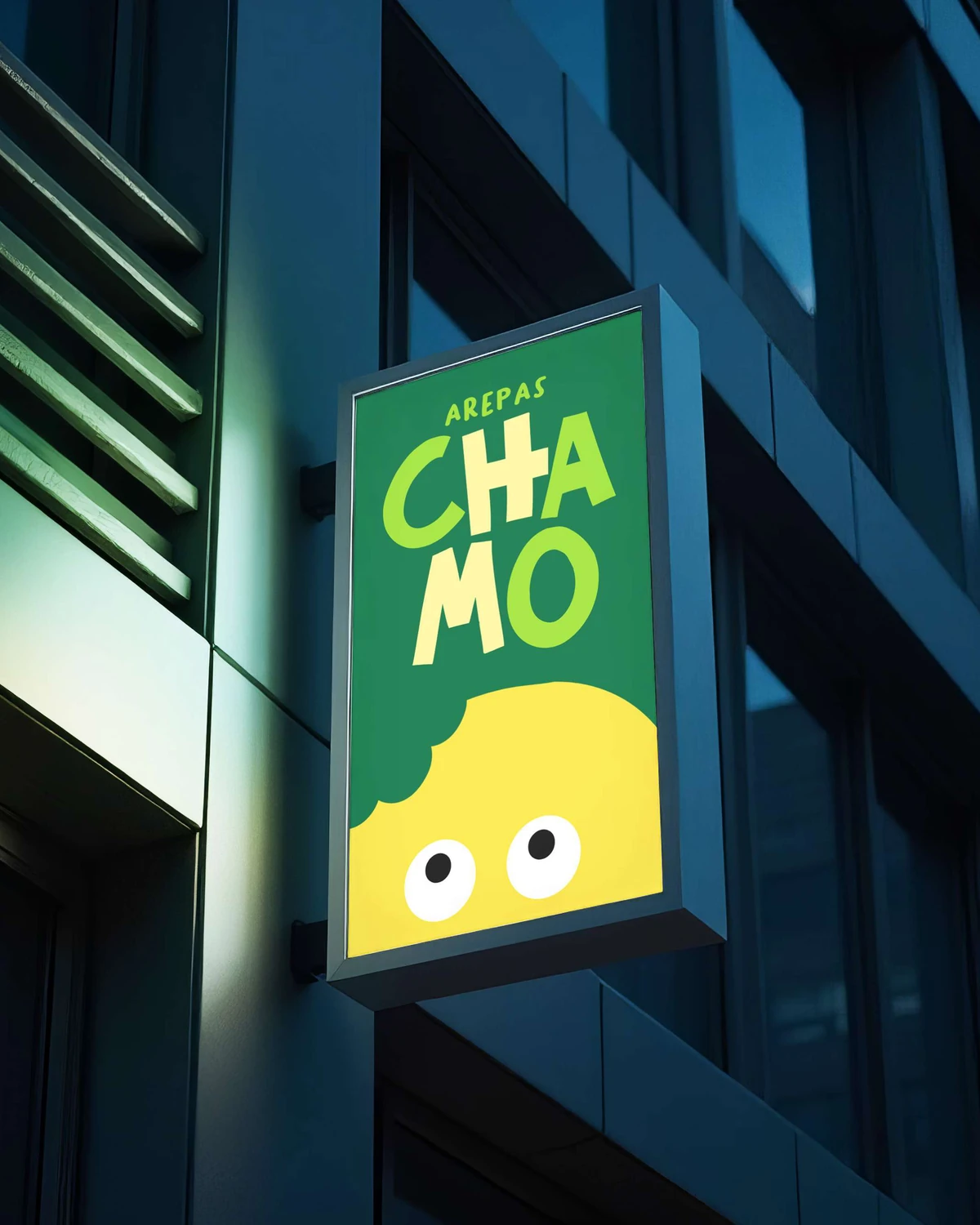 Chamo: the sign lit up at night