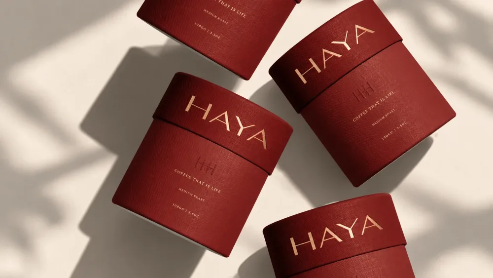 Haya: red coffee tubes with the gold HAYA wordmark