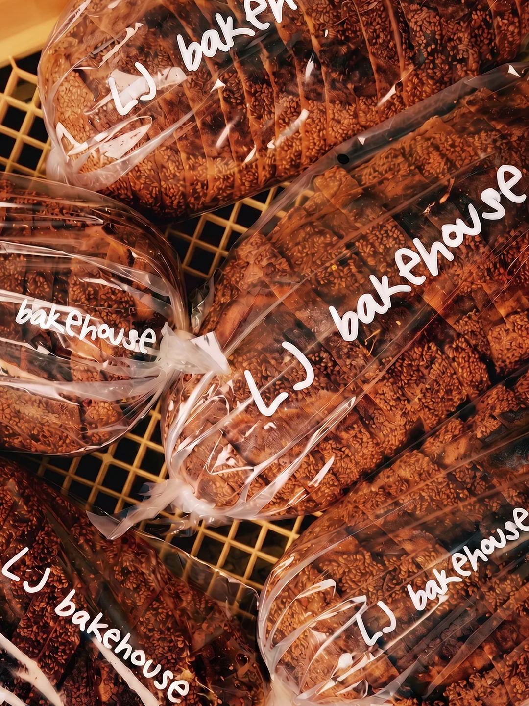 Late June Bakehouse: loaves sealed in clear bags printed with LJ bakehouse