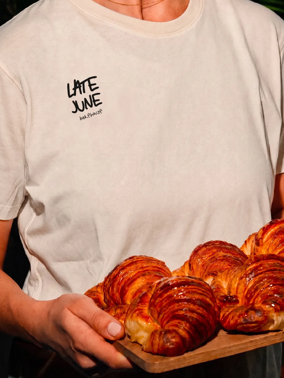 Late June Bakehouse: a cream tee with the stacked wordmark and a tray of croissants