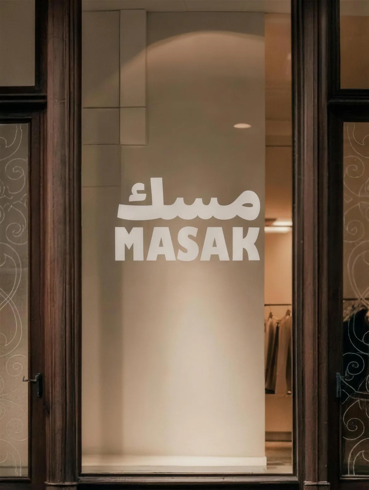 MASAK: the frosted boutique window carrying the mark