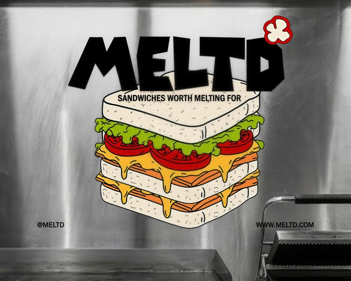 MELTD: the wordmark and sandwich painted across the kitchen wall