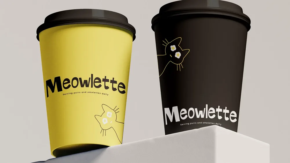Meowlette: the yellow and black takeaway cups