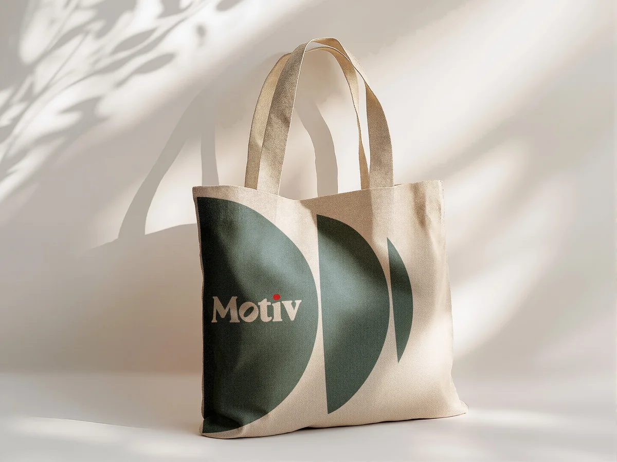 Motiv: the first direction on a tote bag