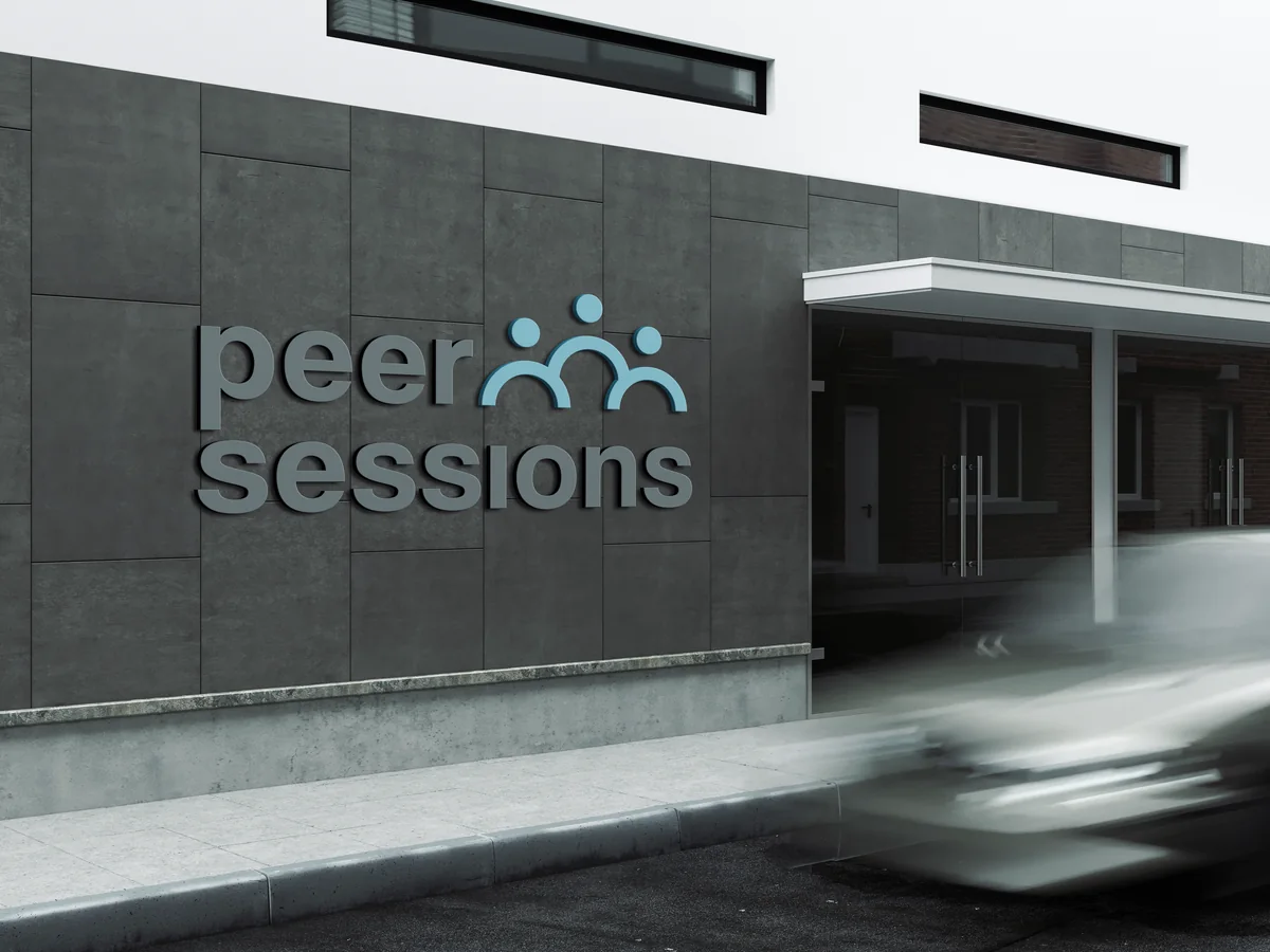 Peer Sessions: dimensional signage on the building