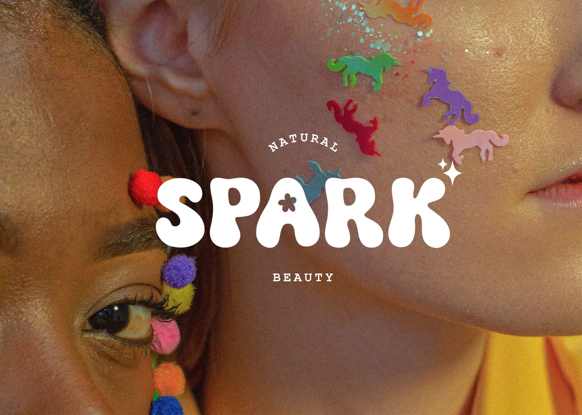 Spark Beauty: the wordmark over the campaign portrait