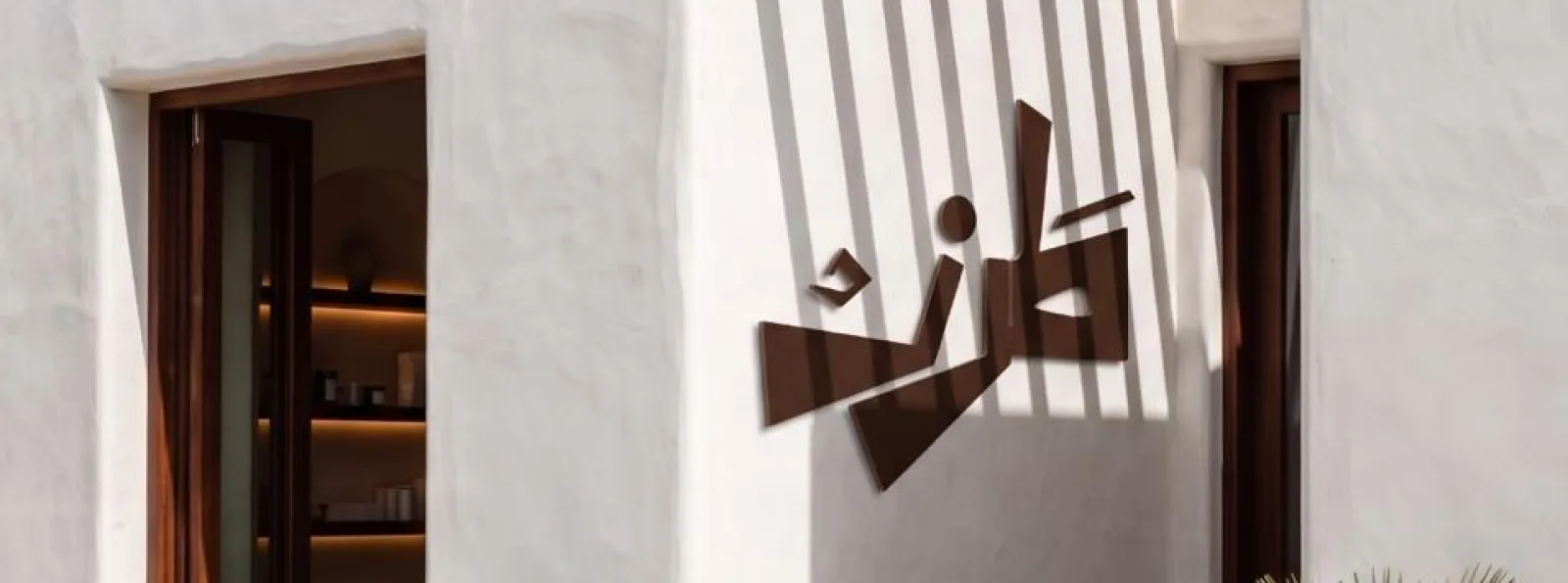 TRZ: the calligraphic wordmark over a dark still life