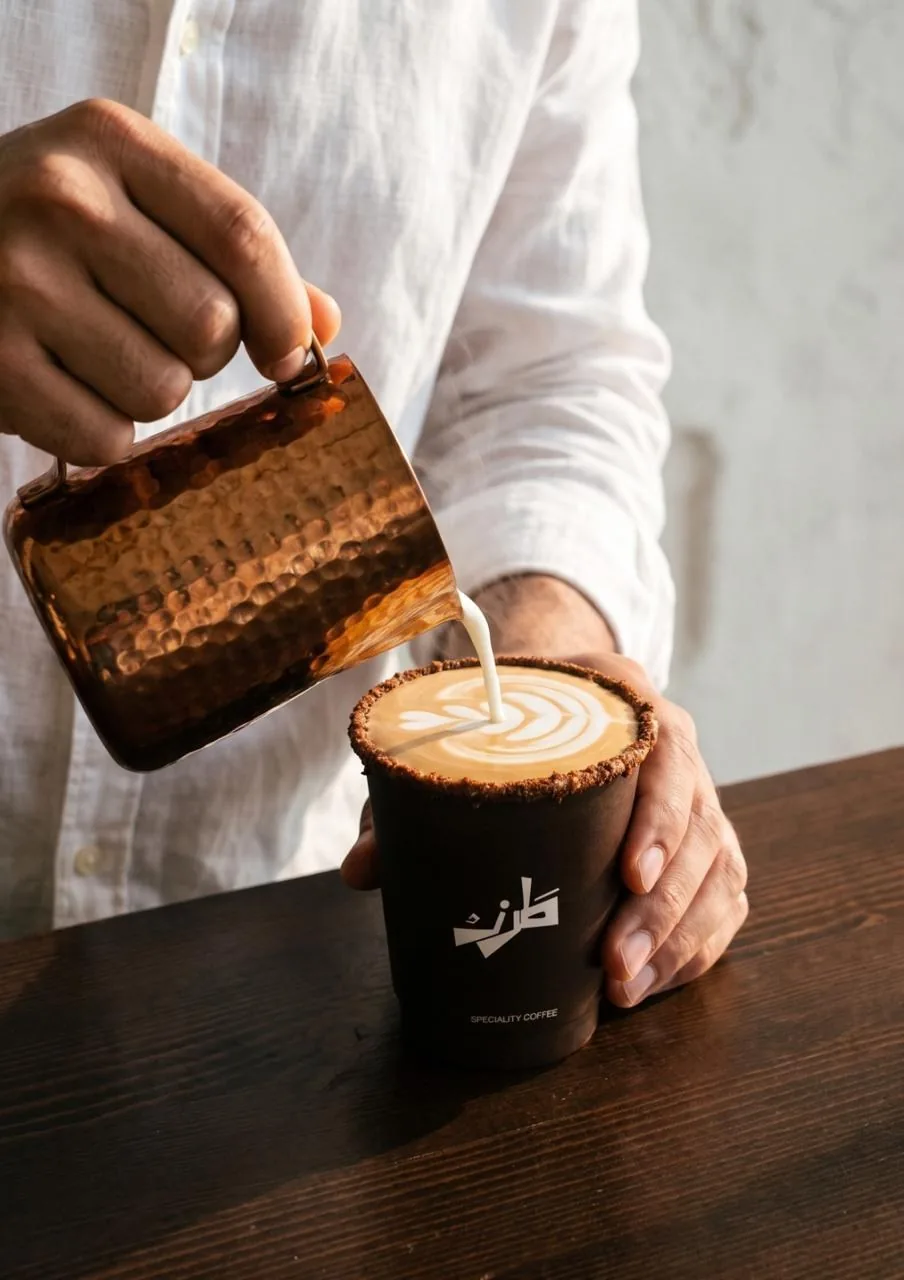 TRZ: milk poured into the cup